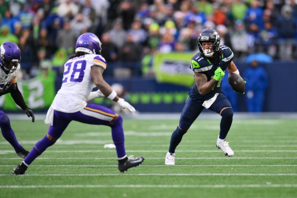 Seattle Seahawks wide receiver Jaxon Smith-Njigba (11) carries the ball after a catch against the Minnesota Vikings during the second half at Lumen Field.