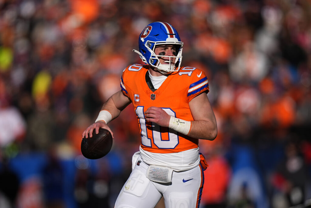 Denver Broncos quarterback Bo Nix (10) during the first quarter against the Kansas City Chiefs at Empower Field at Mile High.