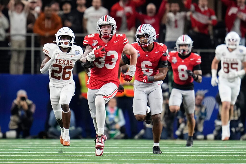 Ohio State defensive end Jack Sawyer (33) returns a fumble recovery for a touchdown against Texas during the 2025 Cotton Bowl at AT&T Stadium in Arlington, Texas.