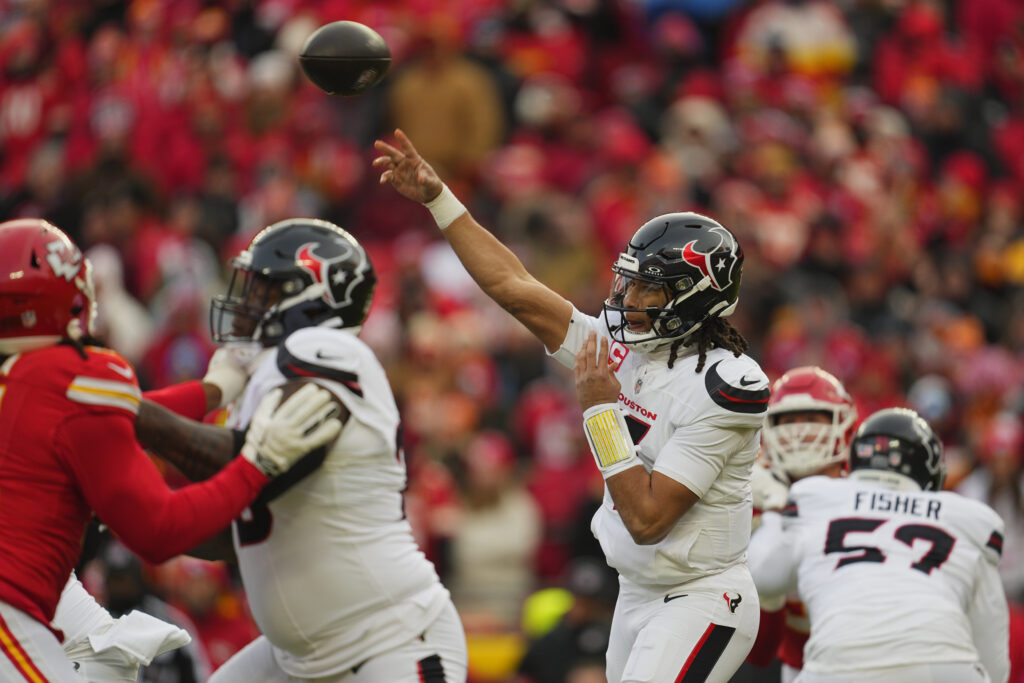 Houston Texans quarterback C.J. Stroud (7) throws a pass against the Kansas City Chiefs during a 2025 AFC divisional round game at Arrowhead Stadium.