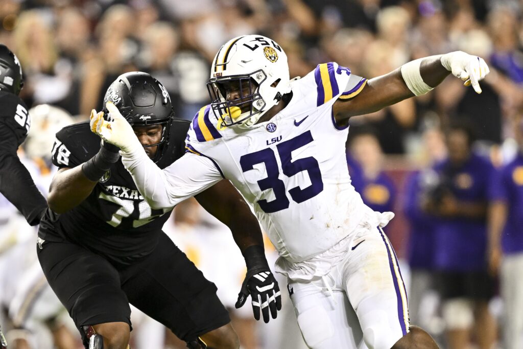 LSU Tigers defensive end Sai'vion Jones (35) defends in coverage during the third quarter against the Texas A&M Aggies.