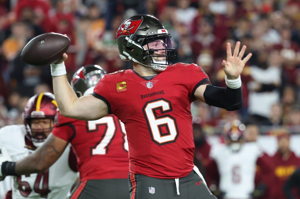 Tampa Bay Buccaneers quarterback Baker Mayfield (6) throws during the second quarter of a NFC wild card playoff against the Washington Commanders.
